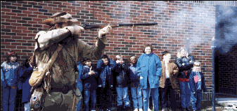 Blue Hawk demonstrates black-powder shooting.